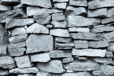 abstract texture of a wall from a natural stone of monochrome tone black and whiteの写真素材