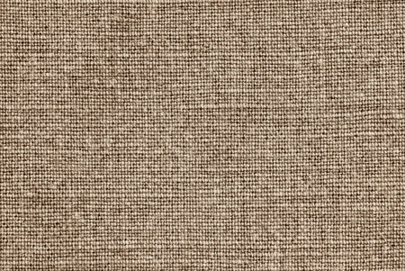 the weave texture of a rough sacking of brown color for abstract backgroundsの写真素材