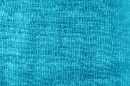 the bright abstract color texture of a gauze is painted in azure colorの写真素材