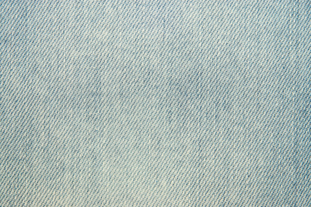 abstract pale texture of the faded fabric for jeansの写真素材