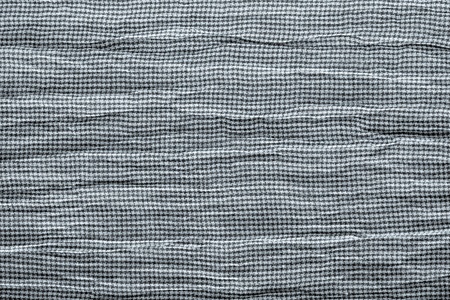 texture crumpled knitted fabric of white gray silvery colorの写真素材