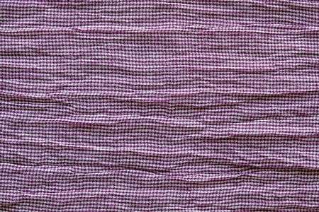 abstract texture of the rumpled cotton fabric with a patternの写真素材