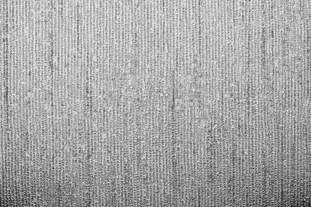 vertical corrugated texture of paper wallpaper with an imprinted vinyl surface for abstract backgrounds of black colorの写真素材