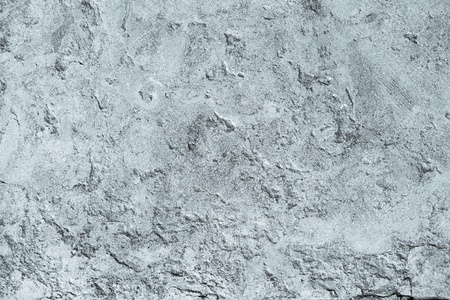 abstract texture of the plastered surface of an old concrete wall for backgrounds of silvery colorの写真素材