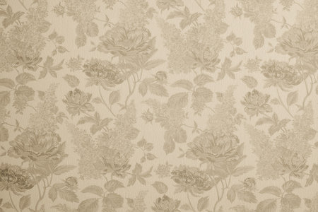 the abstract textured background of beige color with flower patternsの写真素材