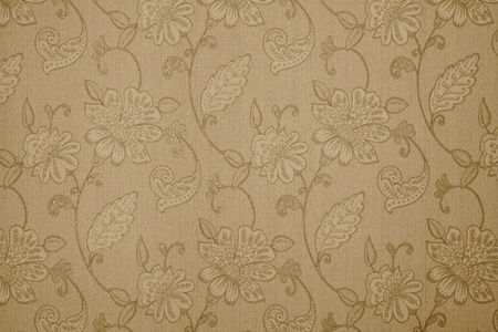 the abstract textured background of beige color with flower patternsの写真素材