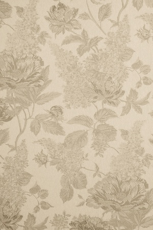 the abstract textured background of beige color with flower patternsの写真素材