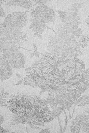 the abstract textured background of gray color with large flower patternsの写真素材