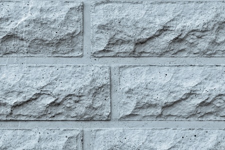 the rough textured concrete wall closeup for abstract backgrounds of silvery colorの写真素材