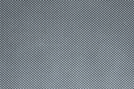 rough texture of wattled fabric for abstract backgrounds of silvery colorの写真素材