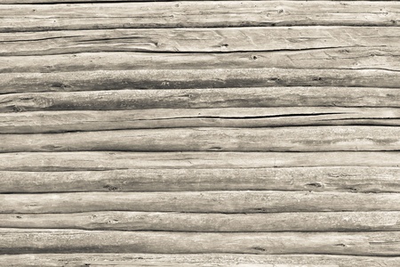 the old rotten wall from wooden logs of beige color is mouldyの写真素材