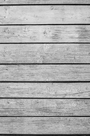 the old painted wooden boards with cracks for the abstract textured backgrounds of gray colorの写真素材
