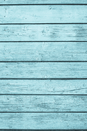 the old painted wooden boards ashy cracks for the abstract textured backgrounds of azure colorの写真素材