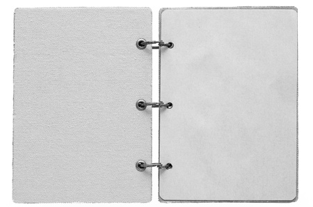 open notebook on a white background with a cover from fabric and with paper pages of gray colorの写真素材