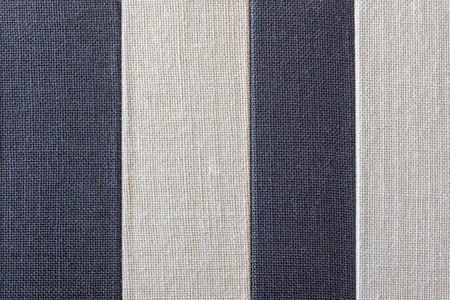 striped textile texture of rough fabric with a blank space for abstract backgrounds and for wallpaperの写真素材