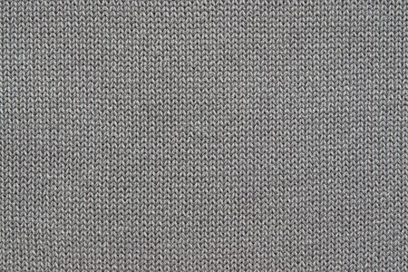 abstract texture of the knitted fabric or woven in the form of herringbone for backgrounds of black gray colorの写真素材