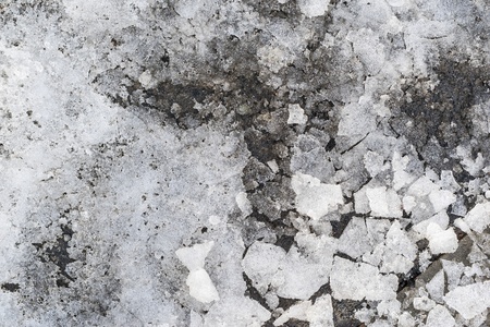 abstract slush from pieces of snow and ice of silvery gray colorの写真素材
