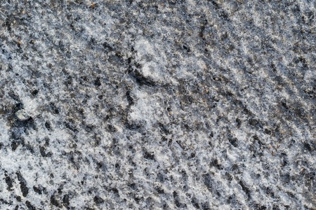 thin covering from frozen snow and ice on an earth surfaceの写真素材