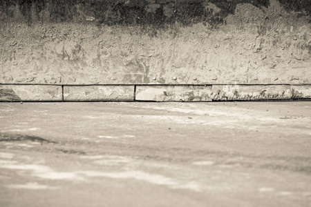 abstract texture of an old dirty scoop of the bulldozer for industrial backgrounds of beige colorの写真素材