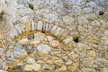 texture of an old stone wall of ancient fortress closeup for abstract backgrounds and for wallpaperの写真素材