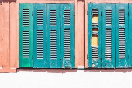 the textured design of an old wooden sun blind or blinds for an abstract architectural backgroundの写真素材