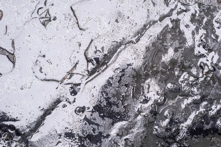 abstract glossy brilliant background of black color for the textured damp or wet wallpaper with water dropsの写真素材
