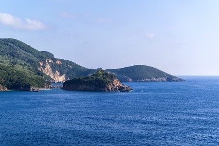 wild hilly or mountain landscape the blue sea and the clear sky for a natural background and for wallpaperの写真素材