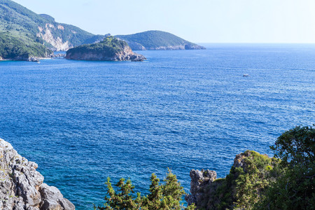 wild hilly or mountain landscape the blue sea and the clear sky for a natural background and for wallpaperの写真素材