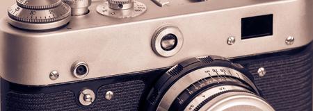 part old camera of brown tone sepia for abstract vintage background closeupの写真素材