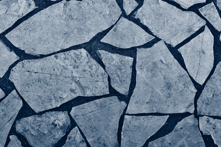 the textured floor surface from a natural stone tile of blue color for an abstract background and for wallpaperの写真素材