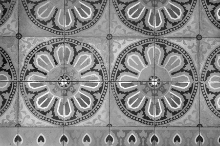 the vintage textured background and pattern of an ancient ornament of monochrome toneの写真素材