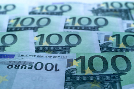 abstract unsharp background a collage from money and currency or from paper banknotes in hundred...