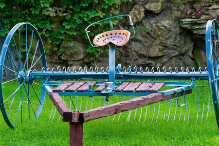 the ancient farm vehicle or the unit for harvesting and strawの写真素材