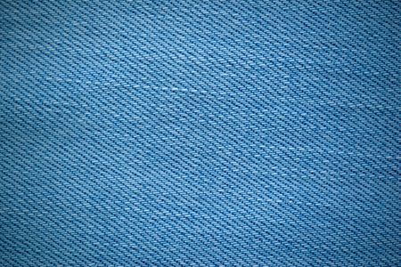 background and texture of denim or jeans fabric closeupの写真素材