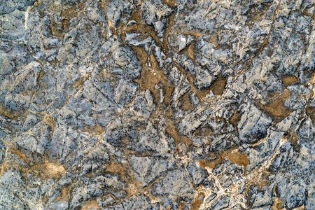 abstract bumpy texture of an old stone for a background or for wallpaper