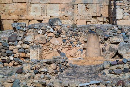 ancient stone wall or ruins for the vintage textured backgroundの写真素材