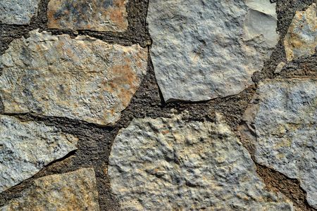 texture of an abstract stone mosaic close up for a background or for wallpaper for a wall or for a floorの写真素材