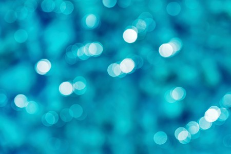 abstract indistinct texture of blue water with ripples for an unsharp background or for wallpaperの写真素材