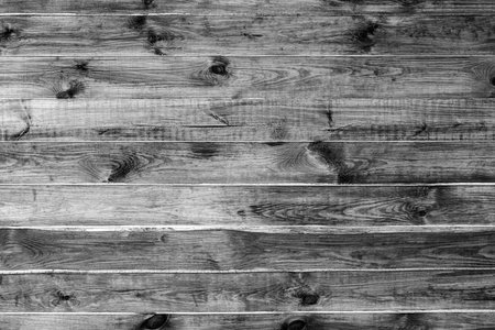 the textured background from wooden boards closeup for a natural background or for wallpaper of...