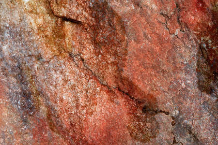 abstract texture closeup of red stone or marble for backgroundの写真素材