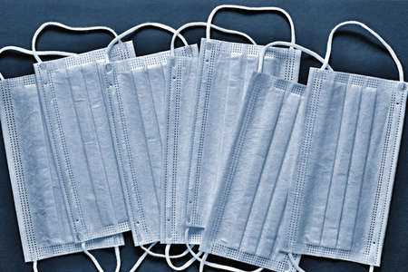 individual disposable medical masks for antibacterial and antimicrobial respiratory protection during the pandemic of coronavirus infectionの写真素材