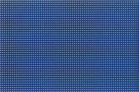 granular corrugated texture with small convex pyramids or teeth of regular square shape for background or for wallpaperの写真素材