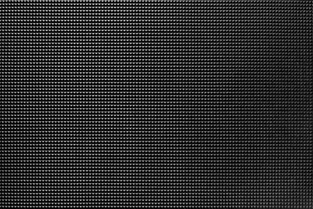 granular corrugated texture with small convex pyramids or teeth of regular square shape for background or for wallpaperの写真素材