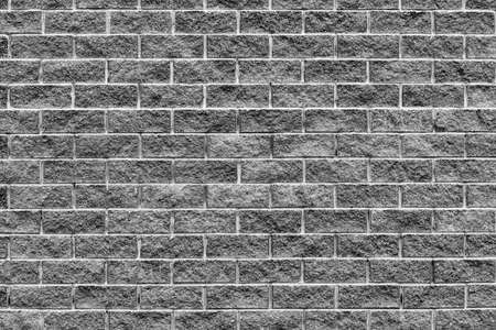 texture of a brick wall for the background on the photo montage or for wallpaper on the desktop computer of monochrome toneの写真素材
