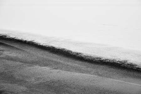 abstract black and white snow surface for background or wallpaper on the computer's raob tableの写真素材