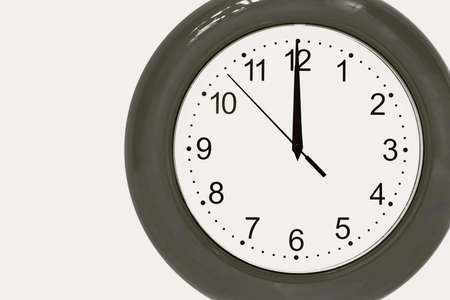 large of gray color analog clock show 12 hours at midnight or noon close-upの写真素材