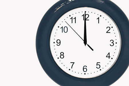large of blue color analog clock show 12 hours at midnight or noon close-upの写真素材