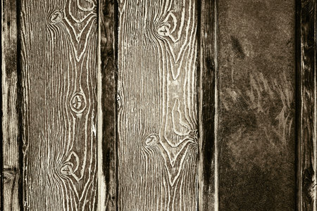 texture of a wooden board of monochrome brown sepia tone for the abstract background or wallpaperの写真素材