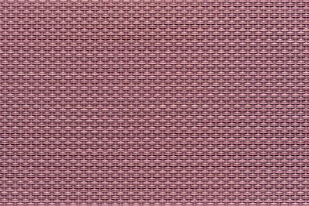 macrotexture of textile material or coarse fabric close-up with symmetric and identical mesh plexus for abstract empty background or for single-tone wallpaperの写真素材