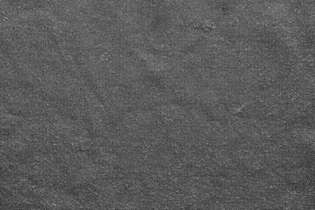black and white texture of knitted fabric close-up for background or wallpaperの写真素材